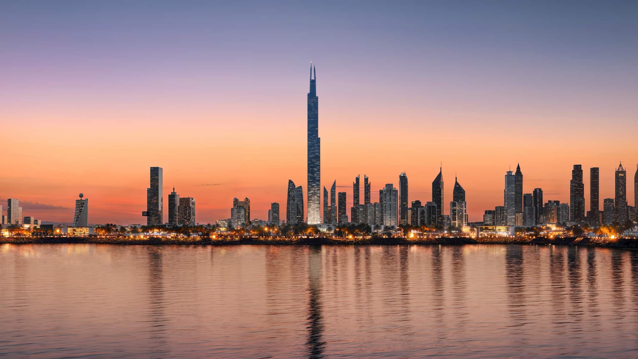 3D Rendering of Burj Azizi: A panoramic depiction of Burj Azizi bathed in warm sunset light, set against the backdrop of Dubai's iconic landscape.